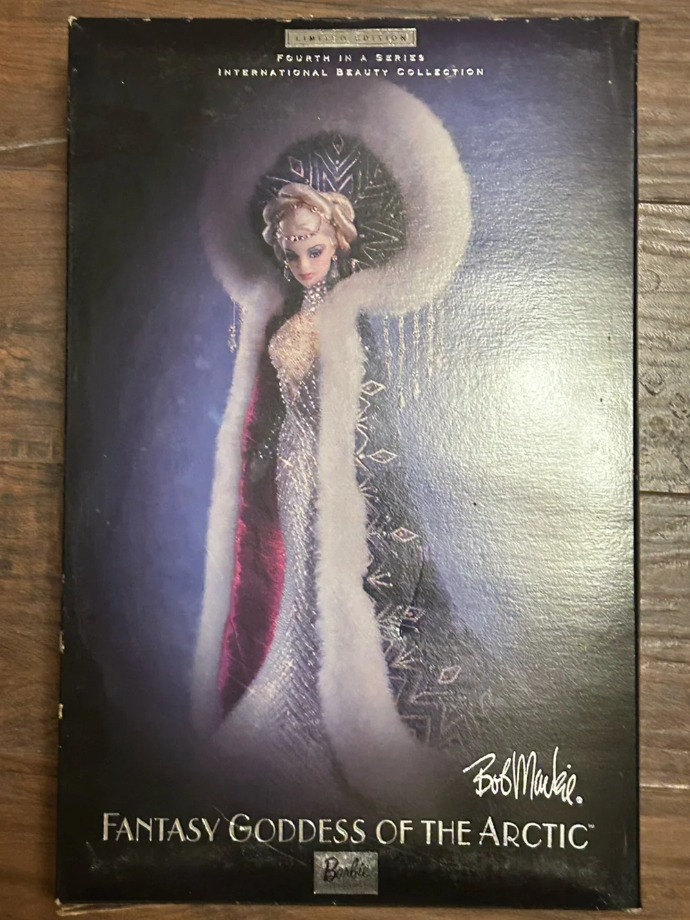 “Fantasy Goddess Of The Arctic” porcelain Barbie, Silver/Fuchsia/beaded gown.